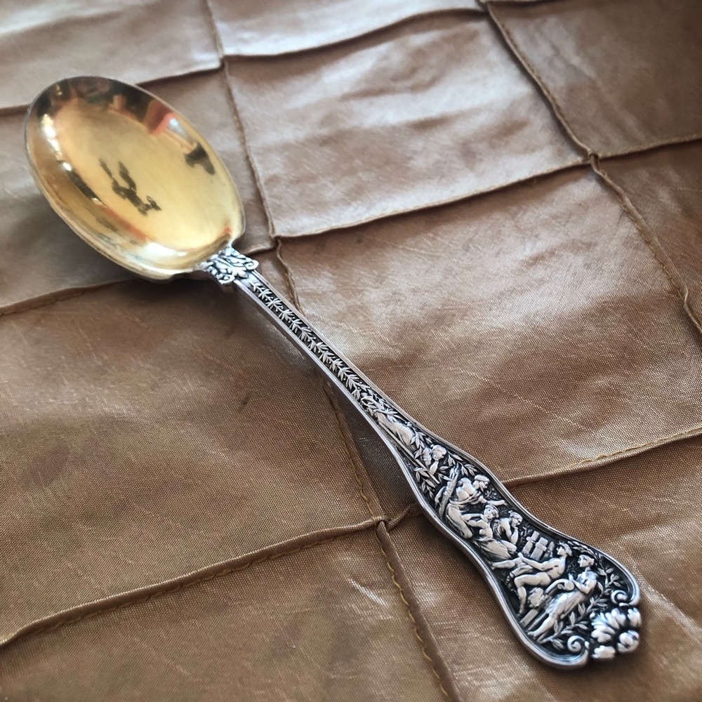Sterling silver late 1800s Tiffany serving spoon with gold washed bowl.